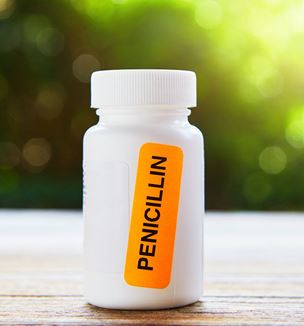 Getty image of medication bottle with penicillin warning label