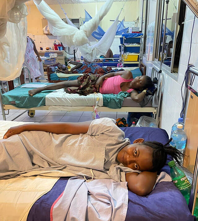 Rachel Pope, MD in Africa with patients