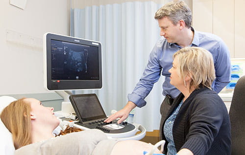 James Strainic, MD performing fetal echocardiography
