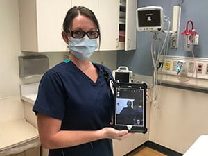 UH Parma ED Manager, Kristin Petro, connects with a THRIVE counselor, Milton Greene III