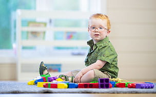 Happy toddler on the carpet