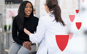 Woman at checkup with doctor