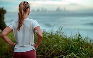 Diabetes woman ready for morning run along the coast
