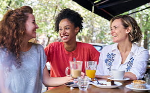 Female friends having quality time at a coffee shop