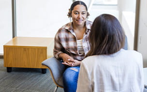Women consulting with a doctor in her office