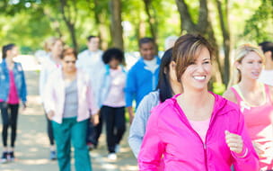 Woman walking in awareness charity race event