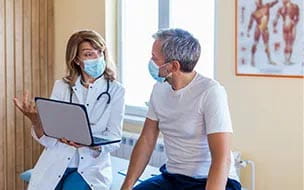A man talking to a doctor