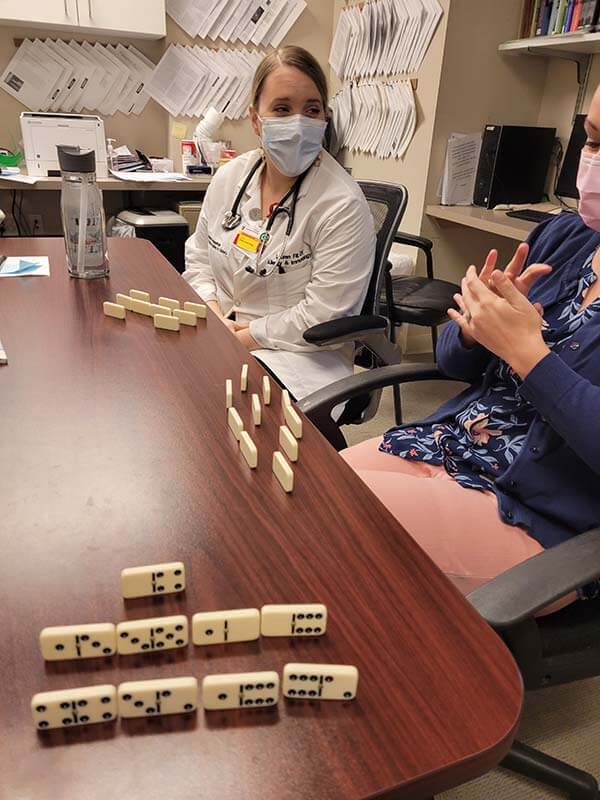 CAOM 2022 playing dominos