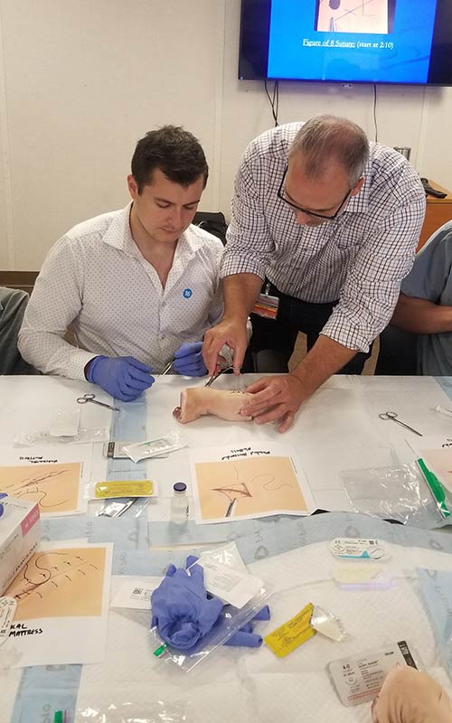 EM resident with teacher