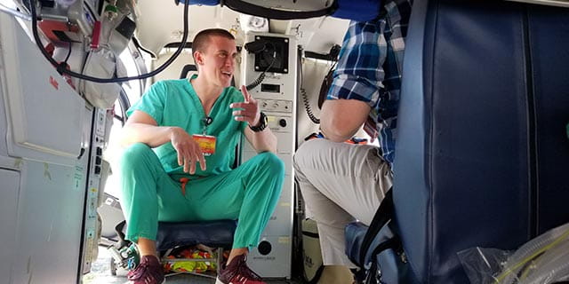 EM residents in heli
