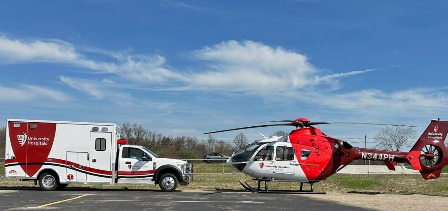 UH helicopter and ambulance side by side