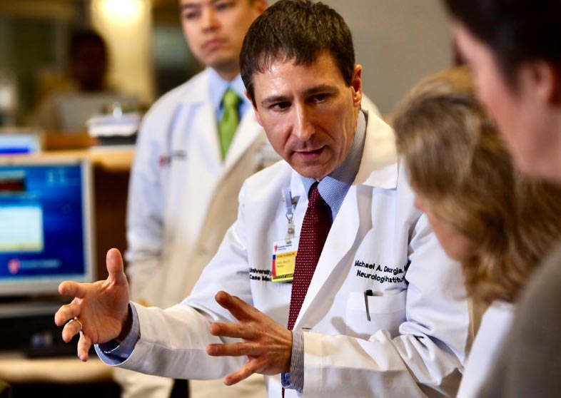 Dr. De Georgia teaching students