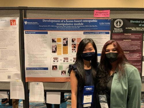 osteopathic student with research poster