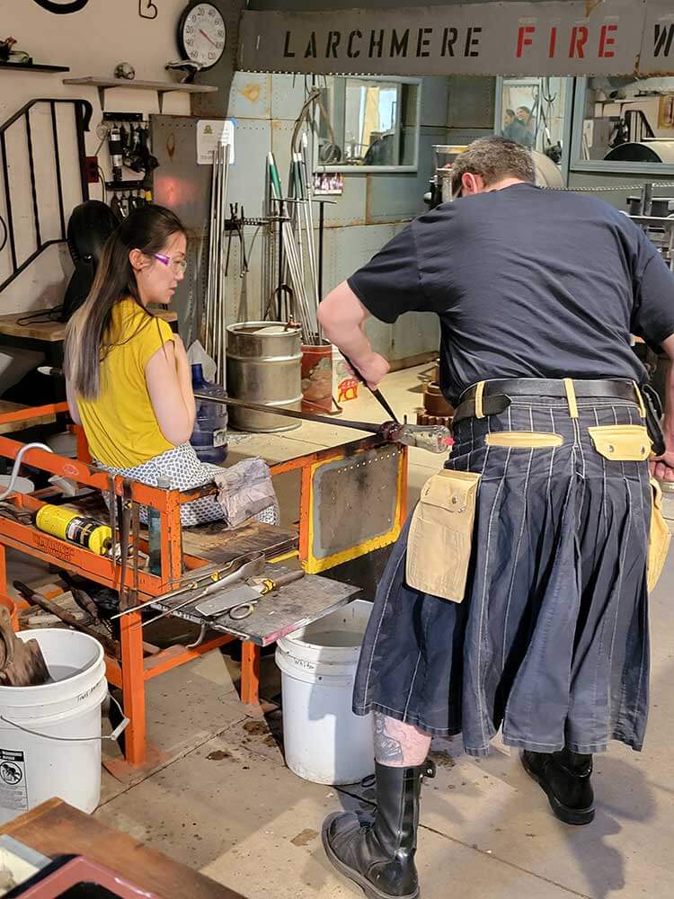 group at glass blowing event