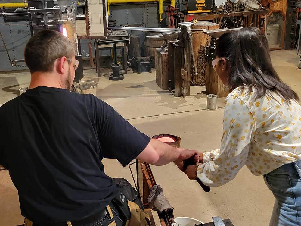 group at glass blowing event