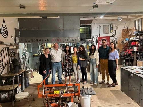 group at glass blowing event