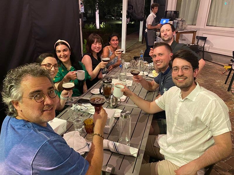 a group of residents with Dr. Ponsky at dinner