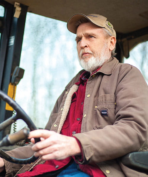 George Miller returns to his active lifestyle driving his backhoe