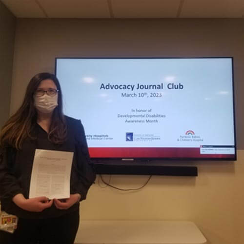 pediatric resident presenting at conference