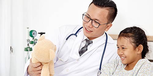 Doctor talking to a Rainbow patient