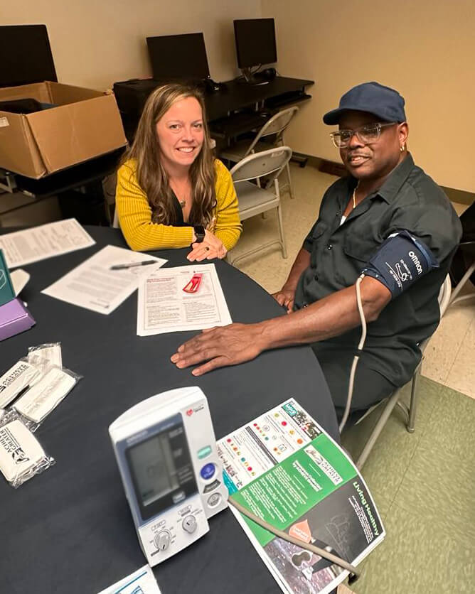 employees taking blood pressure