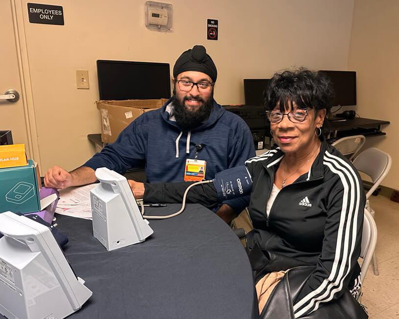 employees taking blood pressure