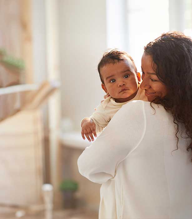 Mother holding infant
