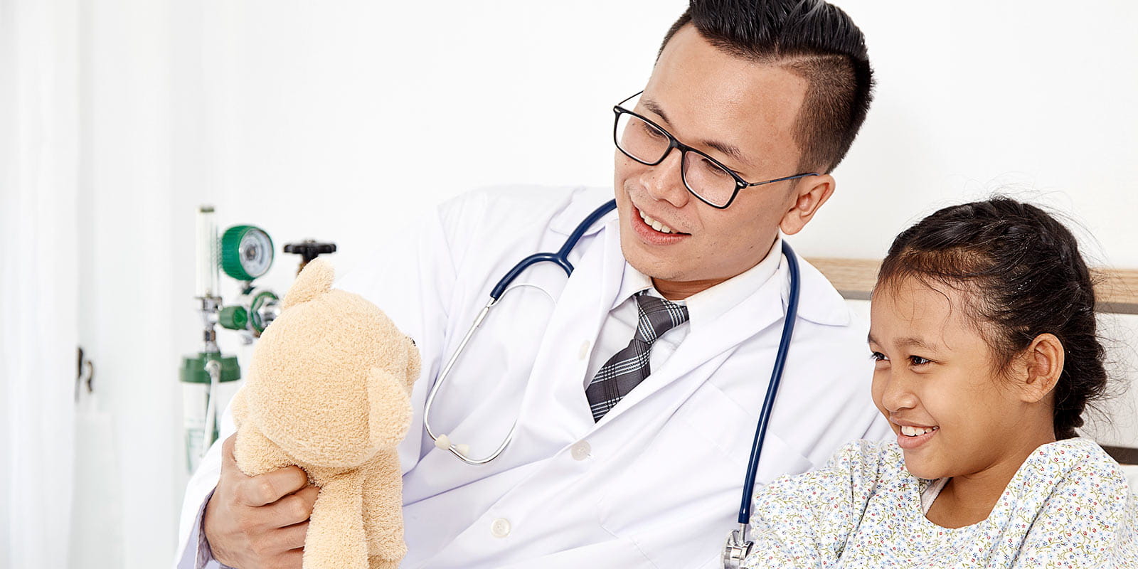 Young kidney patient and her doctor in hospital