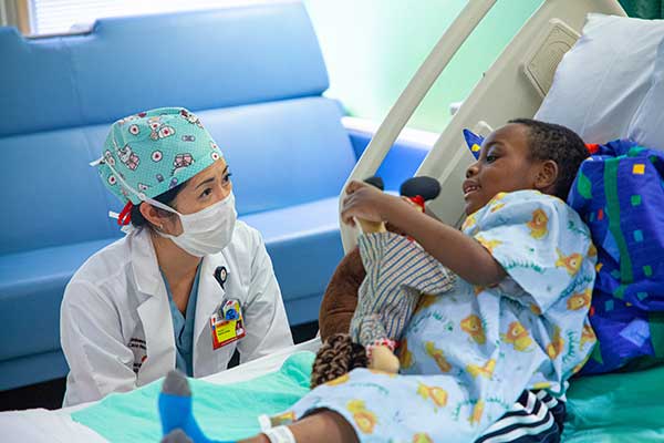 Dr. Lynn Woo with Patient