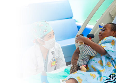 Dr. Lynn Woo with Patient
