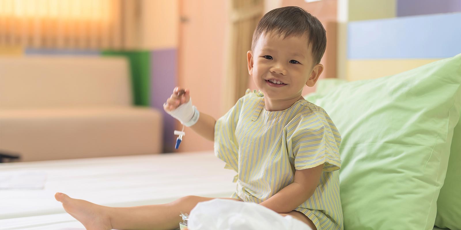 A little boy eagerly awaiting surgery.