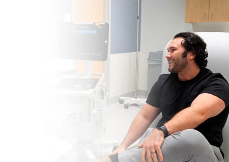 A male patient consults with his doctor at the UH Cutler Center for Men