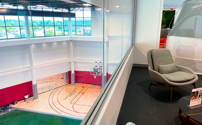 Skybox view of the full-length football field on the building’s first floor