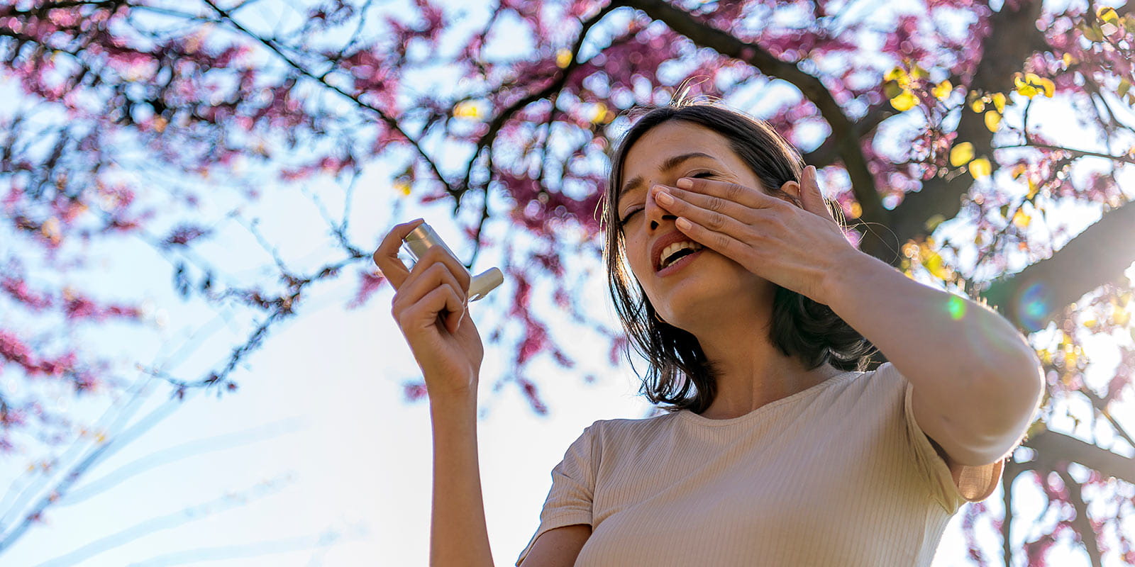 Woman Using Inhaler Outdoor