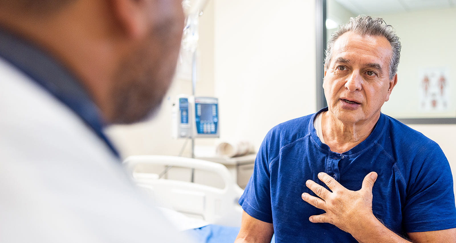 A senior man and his doctor having a conversation about heart health