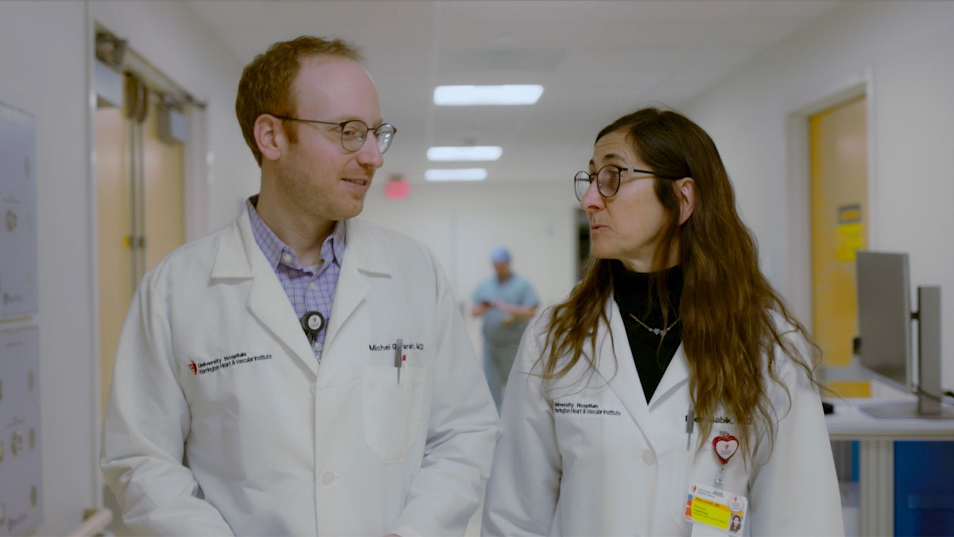 Michel Farah, MD and Ellen Sabik, MD walk the halls of UH Harrington Heart and Vascular Institute