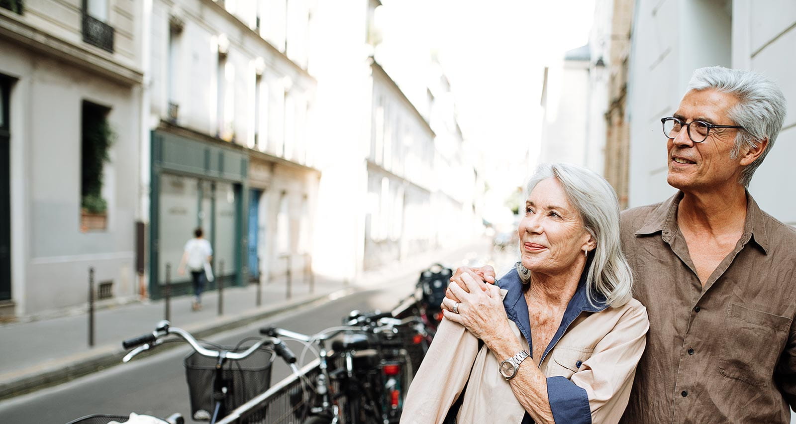 Senior couple walking around the city