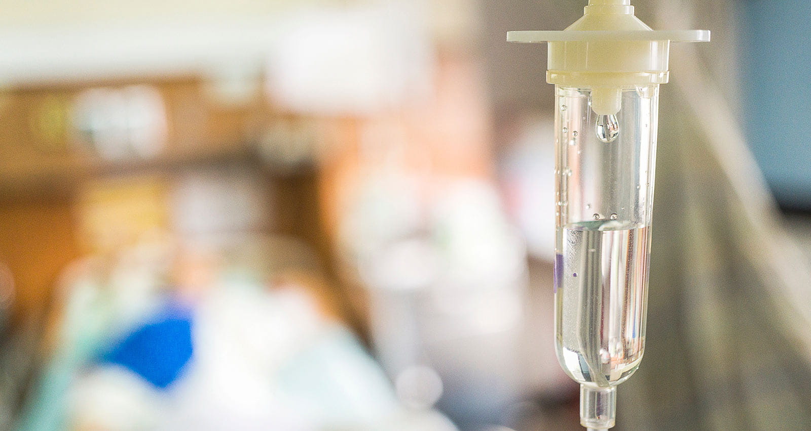 Close-up image of an IV drip in a hospital room