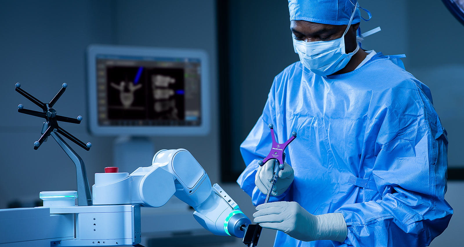 Spine surgeon using robotic guidance © 2018 Jon Rose All Rights Reserved