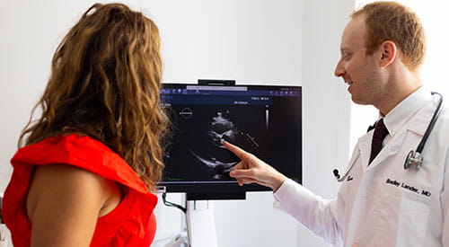 Dr. Brad Lander explaining results to patient at University Hospitals Drusinsky Sports Medicine Institute